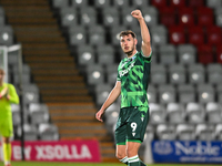 Josh Andrews (9 Gillingham) gestures to fans after scoring the opening goal during the EFL Trophy match between Stevenage and Gillingham at...