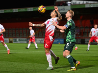 Nick Freeman (7, Stevenage) is challenged by Max Clark (3, Gillingham) during the EFL Trophy match between Stevenage and Gillingham at the L...