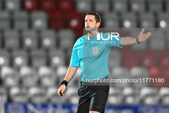 Referee Scott Simpson gestures during the EFL Trophy match between Stevenage and Gillingham at the Lamex Stadium in Stevenage, on November 1...