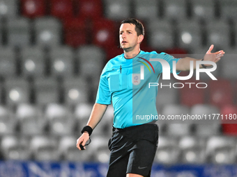 Referee Scott Simpson gestures during the EFL Trophy match between Stevenage and Gillingham at the Lamex Stadium in Stevenage, on November 1...