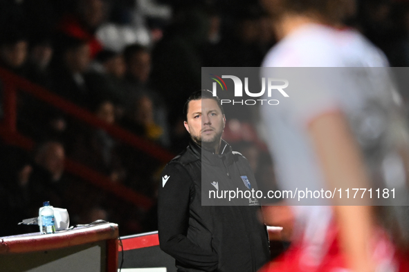 Manager Mark Bonner (Manager of Gillingham) looks on during the EFL Trophy match between Stevenage and Gillingham at the Lamex Stadium in St...