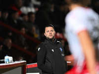 Manager Mark Bonner (Manager of Gillingham) looks on during the EFL Trophy match between Stevenage and Gillingham at the Lamex Stadium in St...