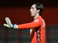 Goalkeeper Ashby Hammond (13 Gillingham) gestures during the EFL Trophy match between Stevenage and Gillingham at the Lamex Stadium in Steve...