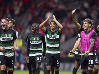 Players of Sporting CP celebrate victory after the Liga Portugal Betclic match between SC Braga and Sporting CP at Estadio Municipal de Brag...