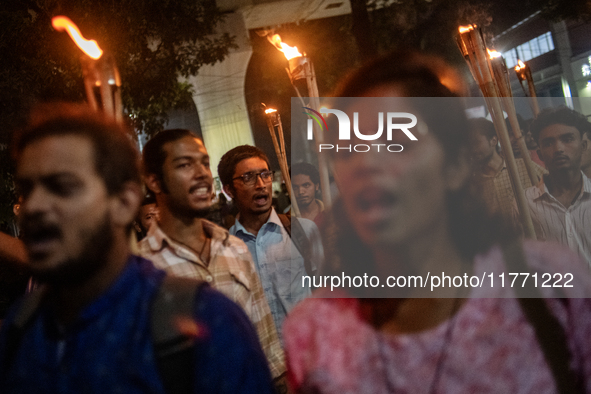 Members of the Bangladesh Students Union hold a torch procession at Dhaka University in Dhaka, Bangladesh, on November 12, 2024. The protest...