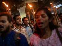 Members of the Bangladesh Students Union hold a torch procession at Dhaka University in Dhaka, Bangladesh, on November 12, 2024. The protest...