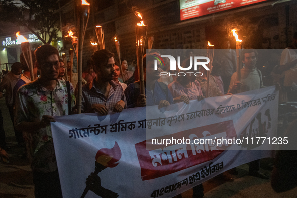 Members of the Bangladesh Students Union hold a torch procession at Dhaka University in Dhaka, Bangladesh, on November 12, 2024. The protest...