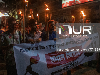 Members of the Bangladesh Students Union hold a torch procession at Dhaka University in Dhaka, Bangladesh, on November 12, 2024. The protest...