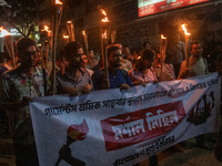 Members of the Bangladesh Students Union hold a torch procession at Dhaka University in Dhaka, Bangladesh, on November 12, 2024. The protest...