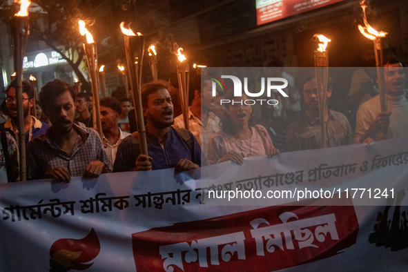 Members of the Bangladesh Students Union hold a torch procession at Dhaka University in Dhaka, Bangladesh, on November 12, 2024. The protest...