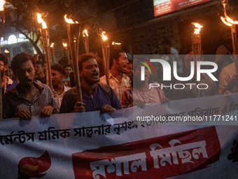 Members of the Bangladesh Students Union hold a torch procession at Dhaka University in Dhaka, Bangladesh, on November 12, 2024. The protest...