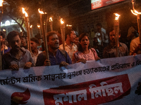 Members of the Bangladesh Students Union hold a torch procession at Dhaka University in Dhaka, Bangladesh, on November 12, 2024. The protest...