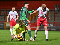 Armani Little (8 Gillingham) challenges Goalkeeper Taye Ashby Hammond (1 Stevenage) during the EFL Trophy match between Stevenage and Gillin...