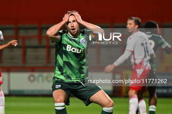 Conor Masterson (4 Gillingham) holds his head after going close during the EFL Trophy match between Stevenage and Gillingham at the Lamex St...