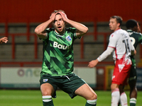 Conor Masterson (4 Gillingham) holds his head after going close during the EFL Trophy match between Stevenage and Gillingham at the Lamex St...