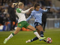 Mary Fowler #8 of Manchester City W.F.C. is tackled by the opponent during the UEFA Champions League Group D match between Manchester City a...