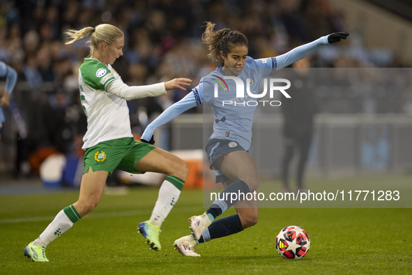 Mary Fowler #8 of Manchester City W.F.C. is tackled by the opponent during the UEFA Champions League Group D match between Manchester City a...