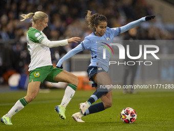 Mary Fowler #8 of Manchester City W.F.C. is tackled by the opponent during the UEFA Champions League Group D match between Manchester City a...