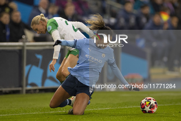 Mary Fowler #8 of Manchester City W.F.C. is tackled by the opponent during the UEFA Champions League Group D match between Manchester City a...