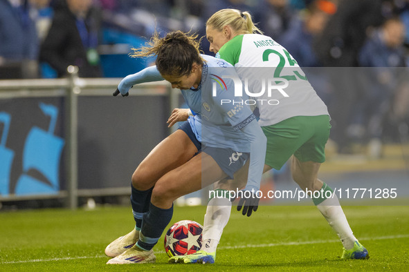 Mary Fowler #8 of Manchester City W.F.C. is tackled by Jonna Andersson #25 of Hammarby IF during the UEFA Champions League Group D match bet...