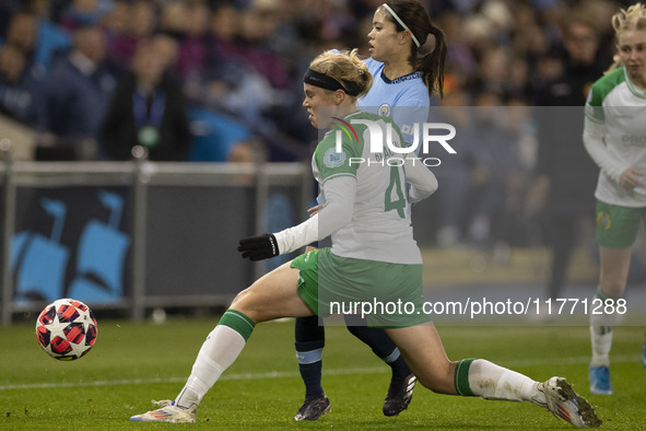 Mary Fowler #8 of Manchester City W.F.C. is tackled by the opponent during the UEFA Champions League Group D match between Manchester City a...