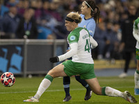 Mary Fowler #8 of Manchester City W.F.C. is tackled by the opponent during the UEFA Champions League Group D match between Manchester City a...