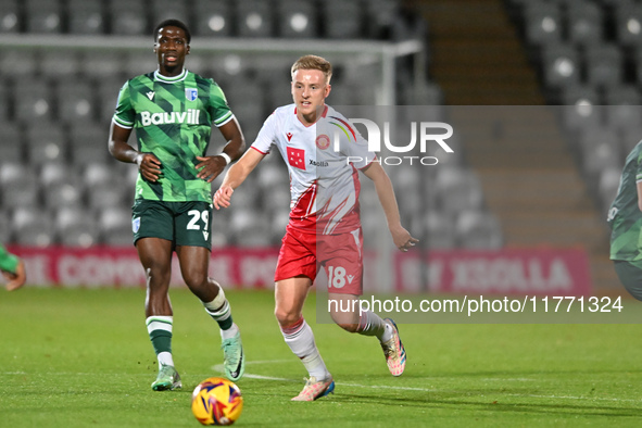 Harvey White, 18, from Stevenage, controls the ball during the EFL Trophy match between Stevenage and Gillingham at the Lamex Stadium in Ste...