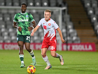 Harvey White, 18, from Stevenage, controls the ball during the EFL Trophy match between Stevenage and Gillingham at the Lamex Stadium in Ste...