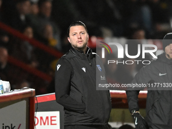 Manager Mark Bonner (Manager Gillingham) looks on during the EFL Trophy match between Stevenage and Gillingham at the Lamex Stadium in Steve...