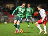 Jack Nolan (7 Gillingham) is challenged by Kane Smith (14 Stevenage) during the EFL Trophy match between Stevenage and Gillingham at the Lam...