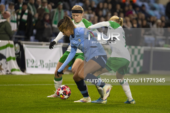 Mary Fowler #8 of Manchester City W.F.C. is tackled by the opponents during the UEFA Champions League Group D match between Manchester City...