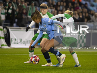 Mary Fowler #8 of Manchester City W.F.C. is tackled by the opponents during the UEFA Champions League Group D match between Manchester City...