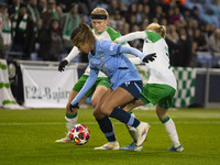 Mary Fowler #8 of Manchester City W.F.C. is tackled by the opponents during the UEFA Champions League Group D match between Manchester City...