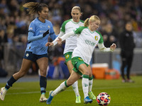 Mary Fowler #8 of Manchester City W.F.C. challenges the opponent during the UEFA Champions League Group D match between Manchester City and...