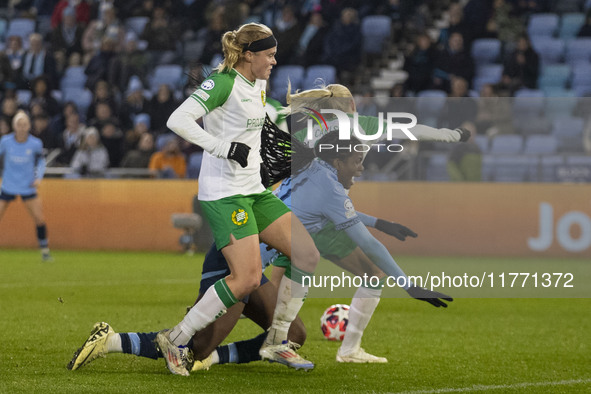 Khadija Shaw #21 of Manchester City W.F.C. is fouled by the opponents during the UEFA Champions League Group D match between Manchester City...