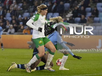 Khadija Shaw #21 of Manchester City W.F.C. is fouled by the opponents during the UEFA Champions League Group D match between Manchester City...