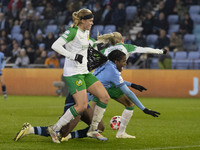 Khadija Shaw #21 of Manchester City W.F.C. is fouled by the opponents during the UEFA Champions League Group D match between Manchester City...