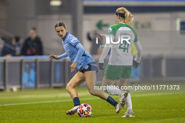 Kerstin Casparij #18 of Manchester City W.F.C. challenges Julie Blakstad #41 of Hammarby IF during the UEFA Champions League Group D match b...