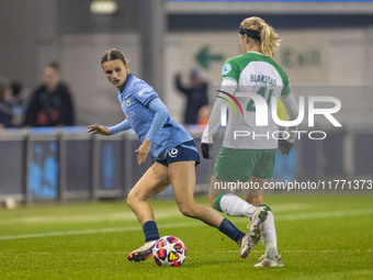 Kerstin Casparij #18 of Manchester City W.F.C. challenges Julie Blakstad #41 of Hammarby IF during the UEFA Champions League Group D match b...