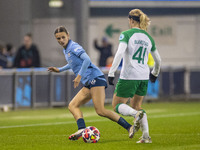 Kerstin Casparij #18 of Manchester City W.F.C. challenges Julie Blakstad #41 of Hammarby IF during the UEFA Champions League Group D match b...