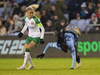 Khadija Shaw #21 of Manchester City W.F.C. is fouled by the opponent during the UEFA Champions League Group D match between Manchester City...