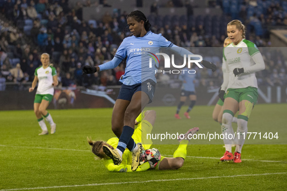 Anna Tamminen #1 (GK) of Hammarby IF makes a save from Khadija Shaw #21 of Manchester City W.F.C. during the UEFA Champions League Group D m...