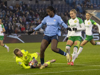 Anna Tamminen #1 (GK) of Hammarby IF makes a save from Khadija Shaw #21 of Manchester City W.F.C. during the UEFA Champions League Group D m...