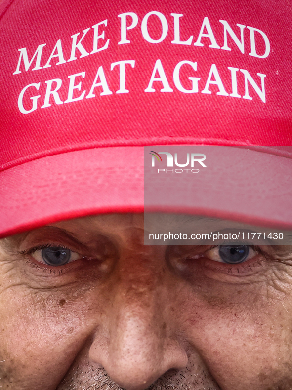 A man wears 'Make Poland Great Again' cap while attending Independence March celebrating the 106 anniversary of Poland regaining independenc...