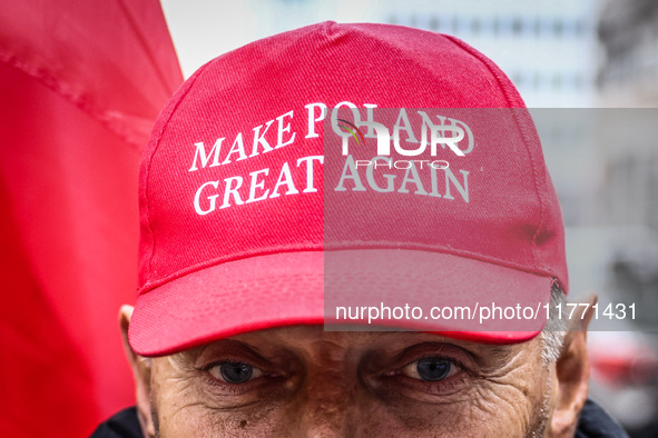 A man wears 'Make Poland Great Again' cap while attending Independence March celebrating the 106 anniversary of Poland regaining independenc...