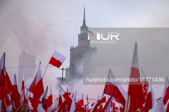 The Palace of Culture and Science is seen during Independence March celebrating the 106 anniversary of Poland regaining independence. Warsaw...