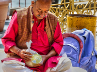 A Hindu priest waits to bless devotees at the Maa Naina Devi Temple in Nainital, Uttarakhand, India, on April 21, 2024. Naina Devi Temple is...