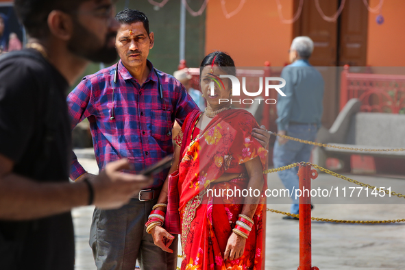 Hindu devotees visit the Maa Naina Devi Temple in Nainital, Uttarakhand, India, on April 21, 2024. Naina Devi Temple is a famous Indian pilg...