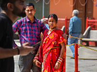 Hindu devotees visit the Maa Naina Devi Temple in Nainital, Uttarakhand, India, on April 21, 2024. Naina Devi Temple is a famous Indian pilg...