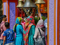 Hindu devotees ring bells while visiting the Maa Naina Devi Temple in Nainital, Uttarakhand, India, on April 21, 2024. Naina Devi Temple is...